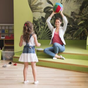 Play-based ABA therapy helping a child learn and connect with her therapist at Shining Star Clinic